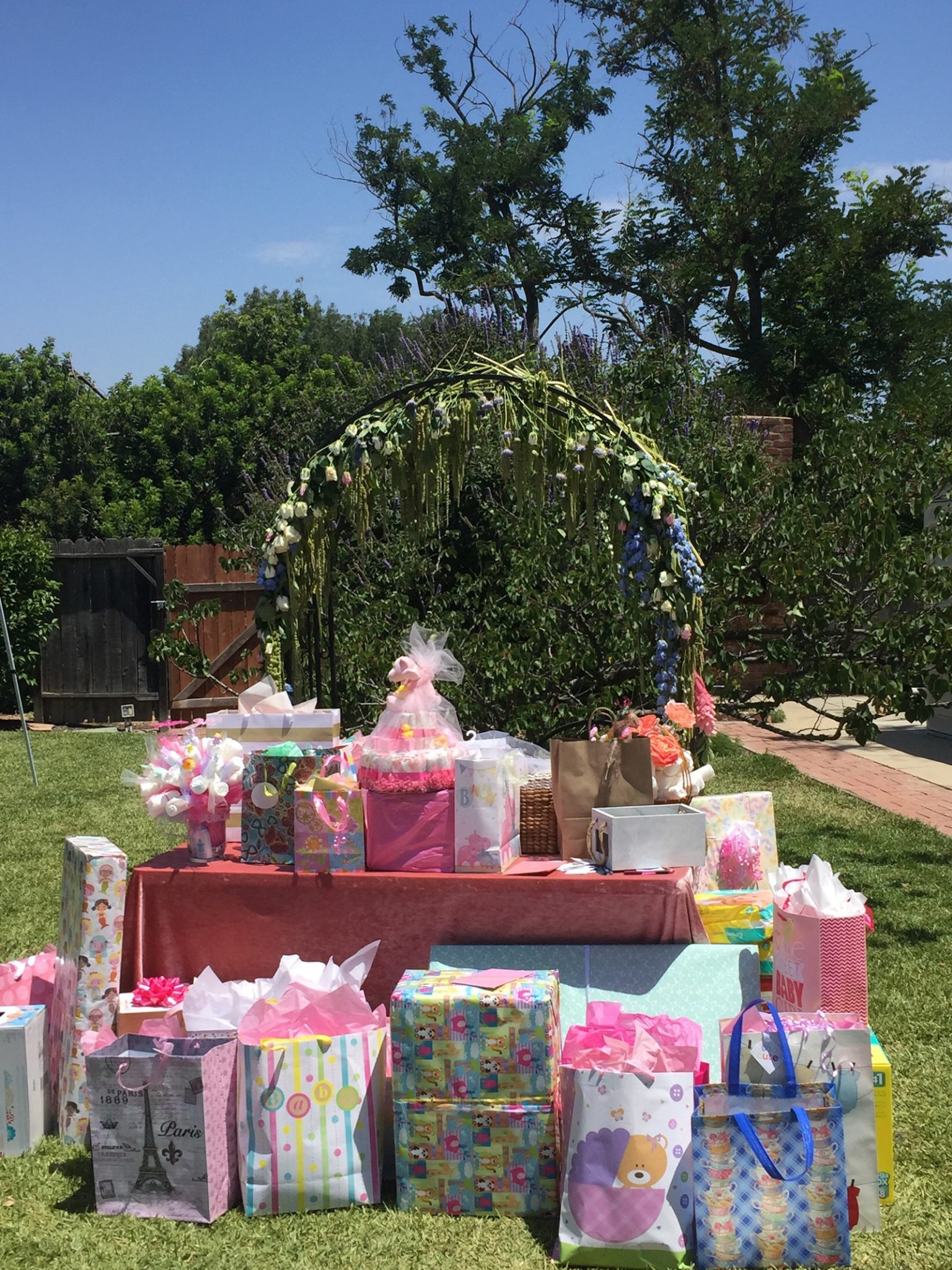 gifts in private garden baby shower