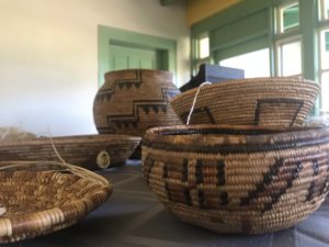 Native American baskets sitting on a table