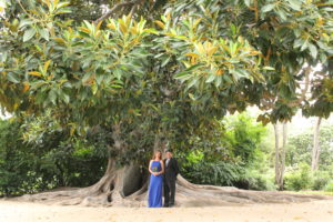 Taken almost 30 years to the day, Kirsten and NEED NAME returned to Rancho Los Cerritos to take a few photos in their favorite spots around the site, including in front of the Moreton Bay Fig.